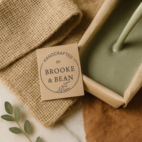 Brooke_Bean_Branding Rustic product scene featuring a Brooke & Bean brand card beside freshly poured green soap in a mould. Natural textures and earthy tones highlight the handcrafted aesthetic, showcasing thoughtful brand design by Bean Creative Marketing.